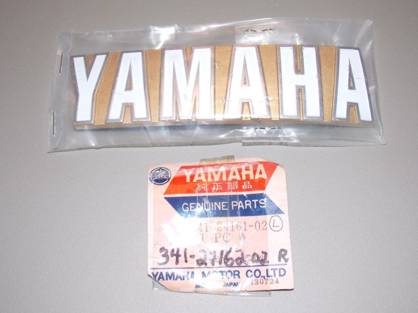 1 pr YAMAHA 1970-74 EMBLEM RIGHT LEFT XS1 TX650 TX750 341-24162-02 341-24161-02 - MotoRaider