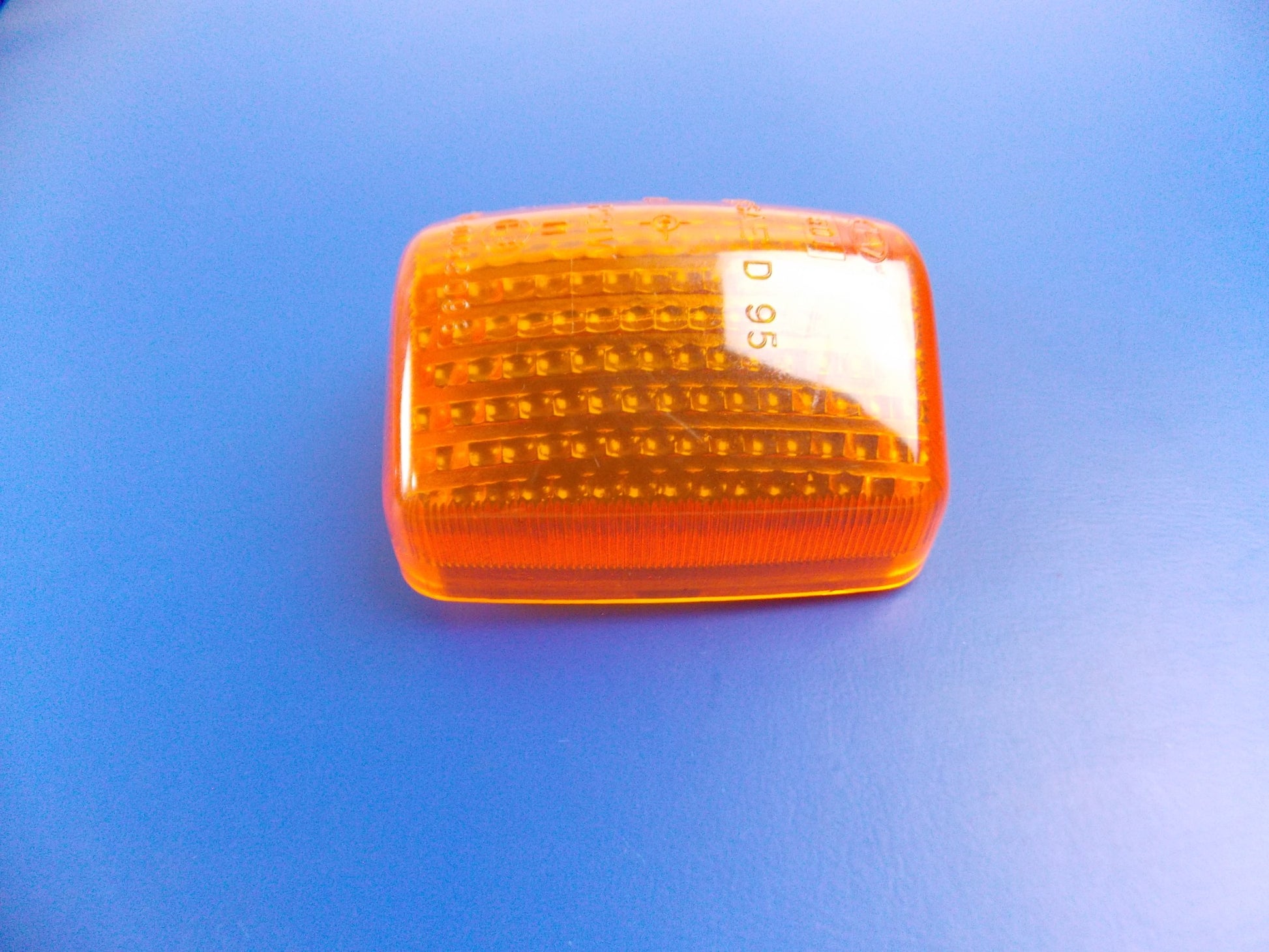 NOS OEM HONDA 1997-99 NX500 FLASHING TURN SIGNAL LIGHT LENS AMBER 33402-MAK-000 - MotoRaider