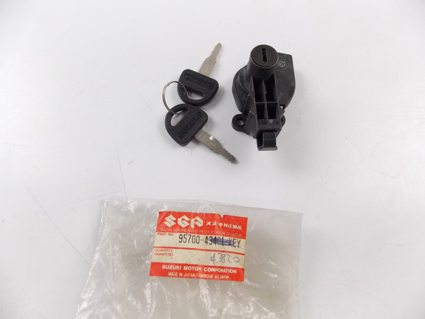 NOS OEM SUZUKI 1986-2000 FB100 SEAT LOCK SET 95700-43820 - MotoRaider