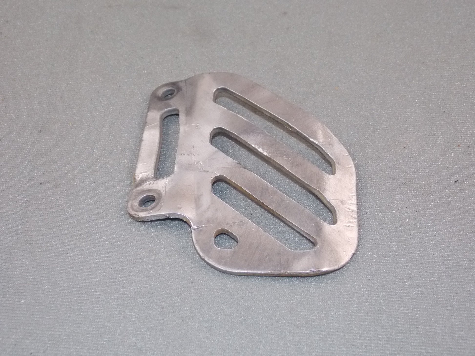 1992 KTM MXC 250 REAR WHEEL BRAKE CALIPER ALUMINUM PLATE GUARD PROTECTOR SHIELD - MotoRaider