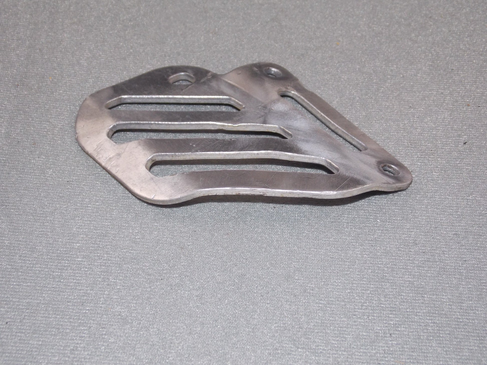 1992 KTM MXC 250 REAR WHEEL BRAKE CALIPER ALUMINUM PLATE GUARD PROTECTOR SHIELD - MotoRaider