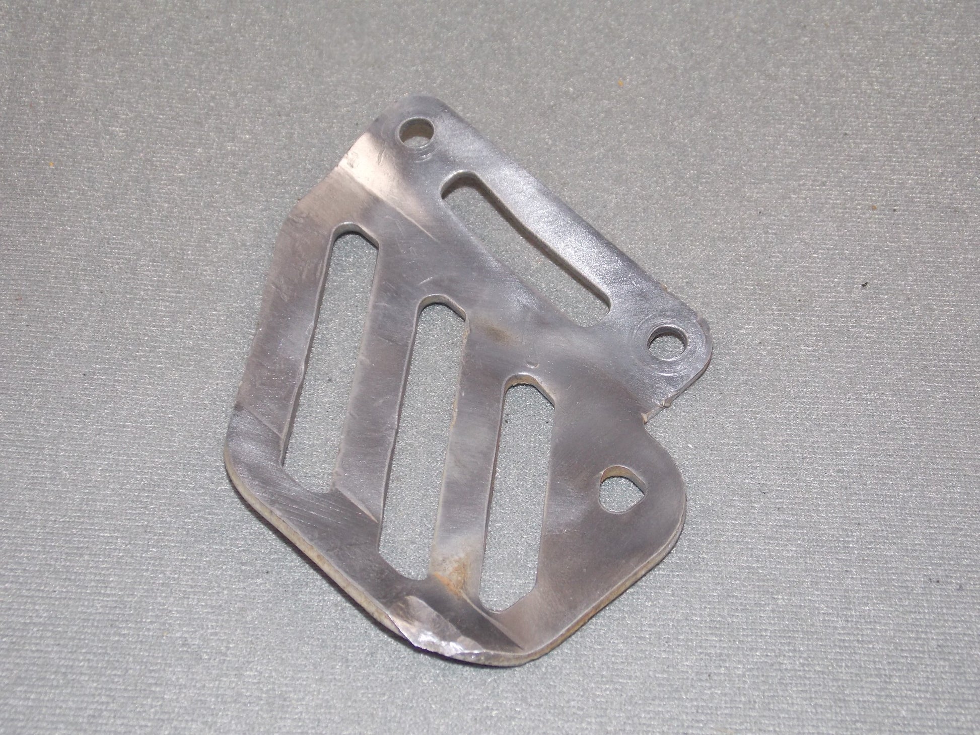 1992 KTM MXC 250 REAR WHEEL BRAKE CALIPER ALUMINUM PLATE GUARD PROTECTOR SHIELD - MotoRaider