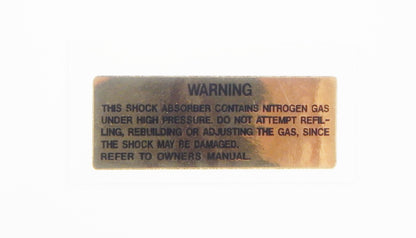 REAR SHOCK ABSORBER NITROGEN WARNING STICKER EMBLEM DECAL GOLD 2x1" VINTAGE - MotoRaider