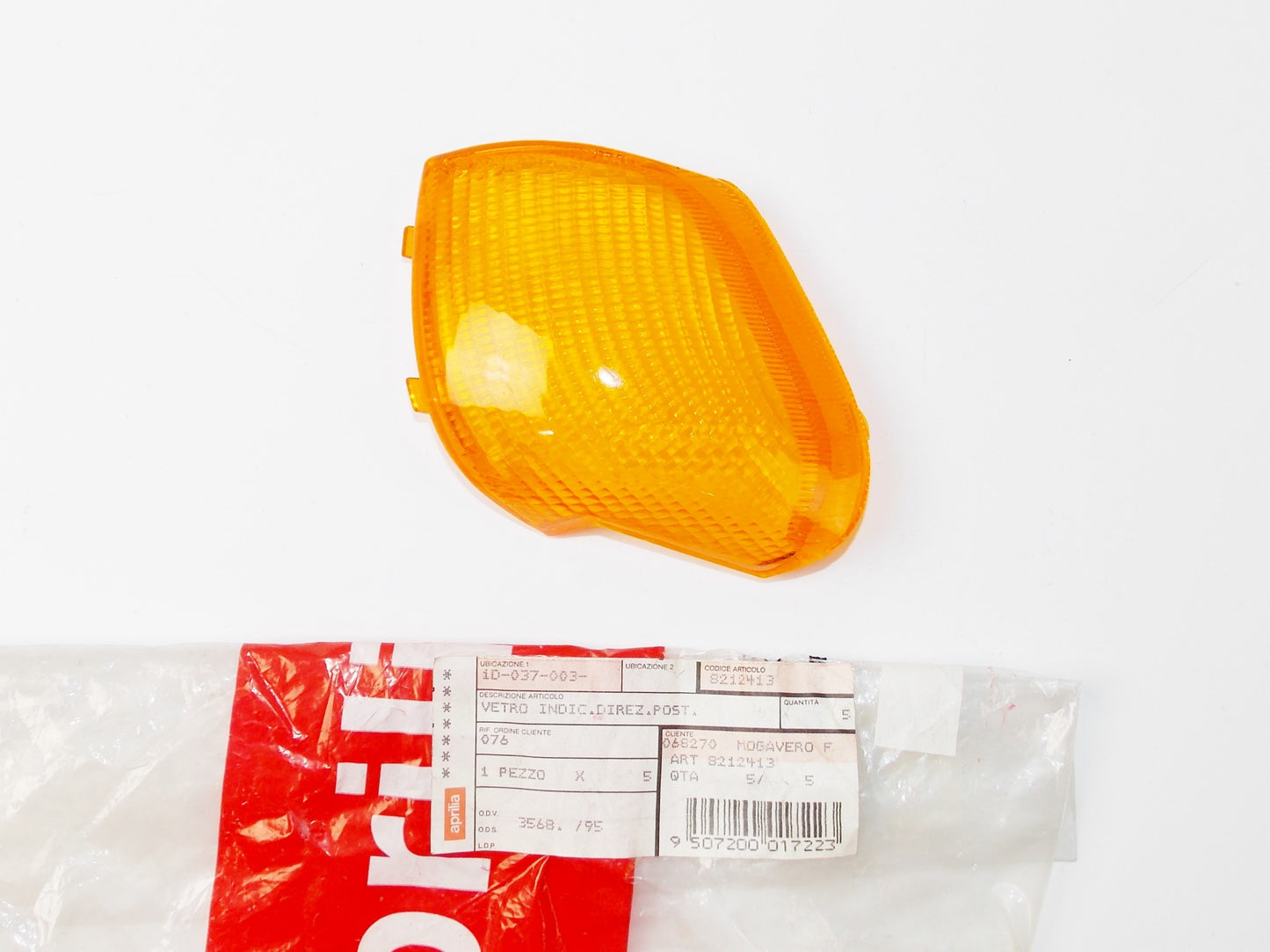 NOS OEM 1992 APRILIA AMICO LX50 TURN SIGNAL INDICATOR LENS REAR AMBER AP8212413 - MotoRaider