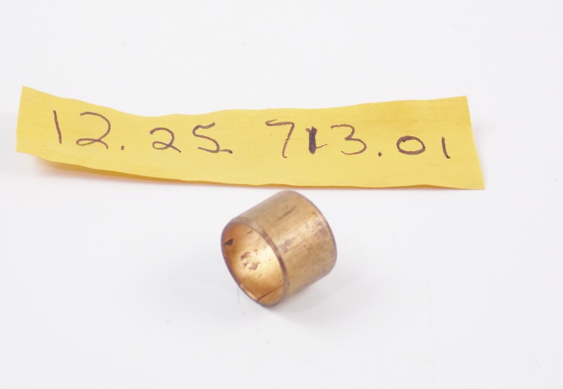 NOS OEM HUSQVARNA 1984 CR125 COPPER BUSHING SLEEVE SPACER 122571301 - MotoRaider