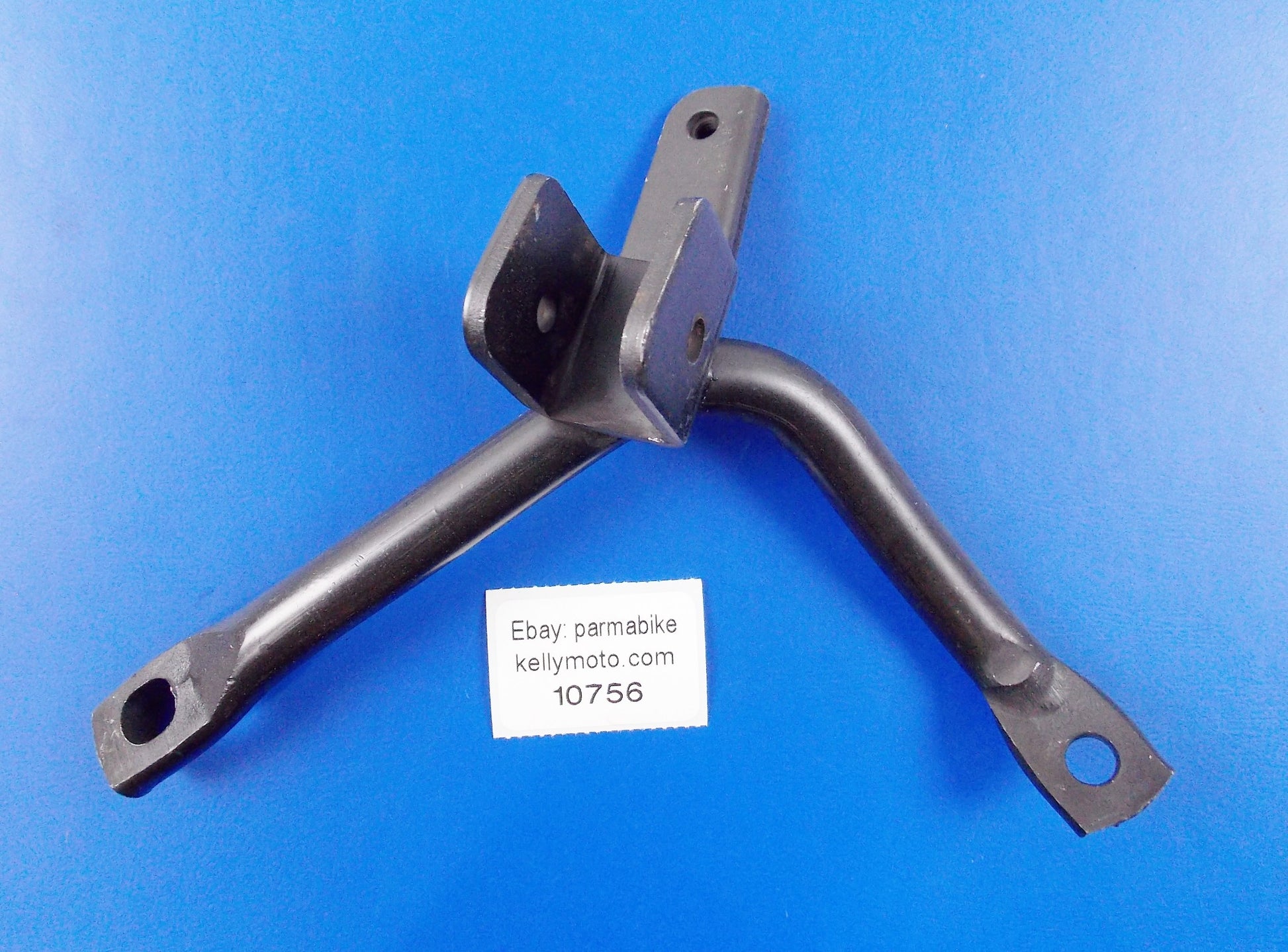 OEM HONDA 2003-06 NES125 PASSENGER RIGHT FOOT-BOARD BRACKET MOUNT 50715-KPZ-900 - MotoRaider