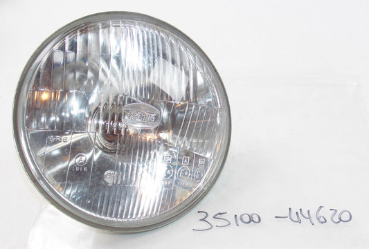 NOS SUZUKI 1979 GS400 HEADLIGHT LAMP UNIT REFLECTOR 35100-44620 - MotoRaider