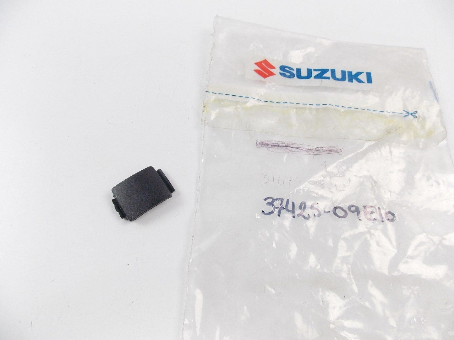 NOS OEM 1994-2001 SUZUKI DINNER SWITCH HOLE CAP  AP501/50 AY50  37425-09E10 - MotoRaider