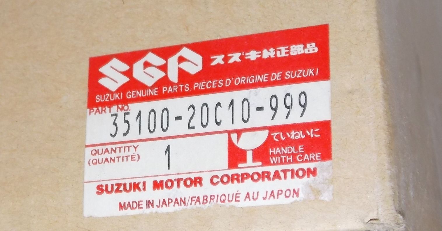 NOS SUZUKI 1988 1989 1990 1992 1994 1997 GSX600 GSX750 HEADLIGHT 35100-20C10-999 - MotoRaider