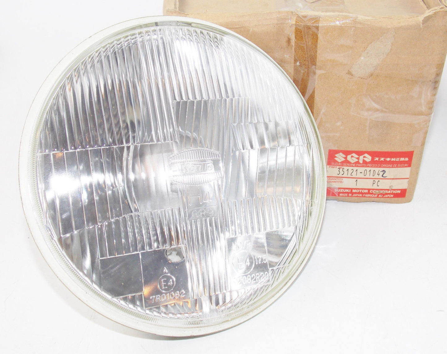 NOS SUZUKI 1991 1992 1993 VX800 GS500 HEADLIGHT LAMP UNIT REFLECTOR 35121-01D42 - MotoRaider