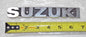 NOS 1980'S "SUZUKI" GAS TANK SILVER EMBLEM MARK BADGE FUEL VINTAGE - MotoRaider