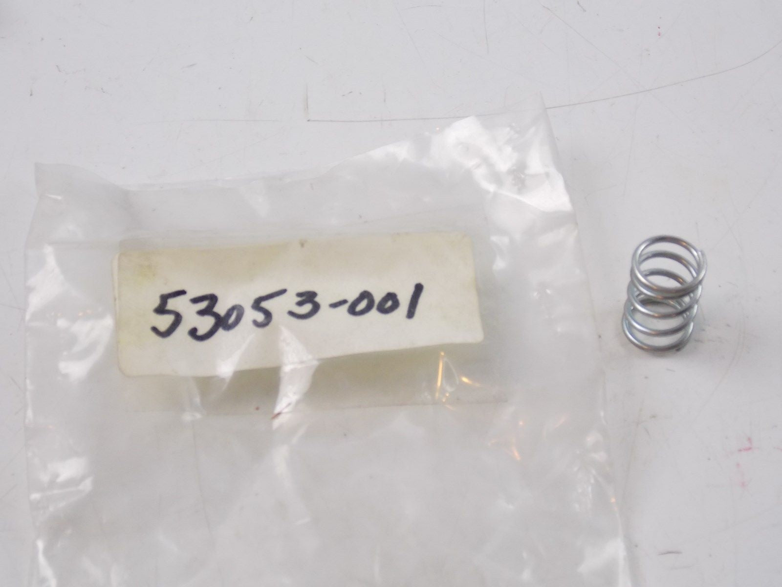 NOS KAWASAKI 1973 1974 1975 SEAT LOCK SPRING Z1  53053-001 - MotoRaider