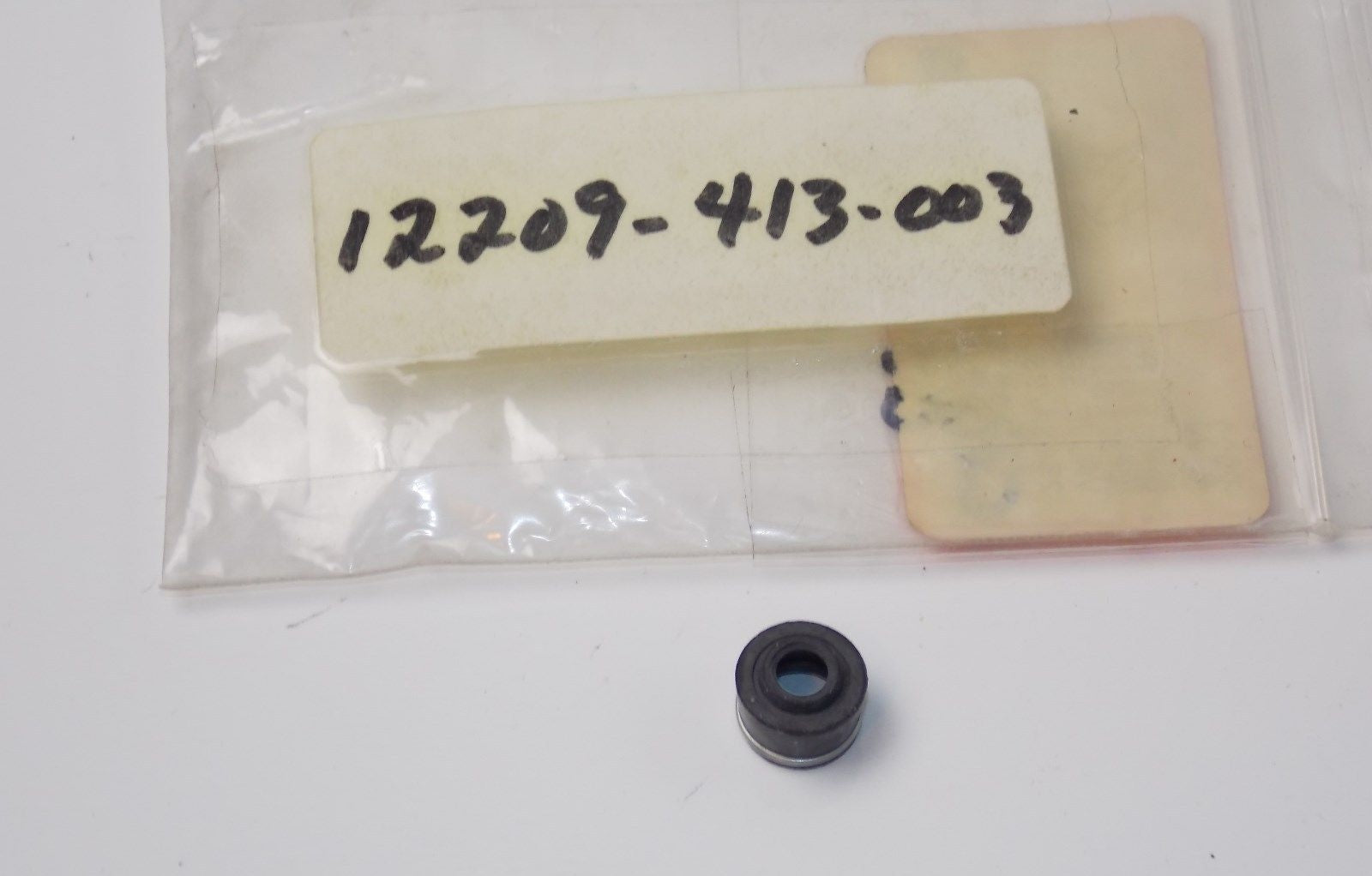 NOS HONDA VALVE SEAL 1979-2015 TRX700 CMX450 VTX1300 CB400 CM400  12209-413-003 - MotoRaider