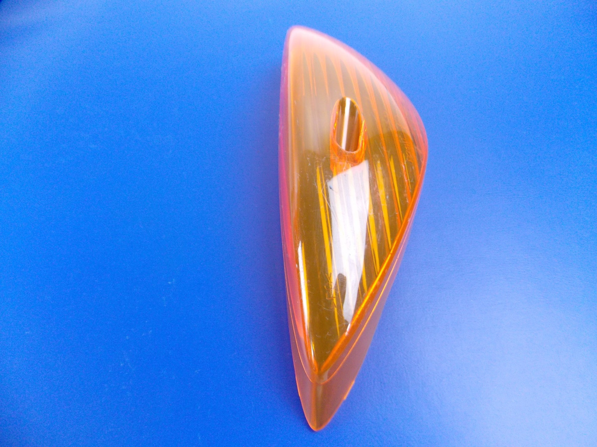 NOS OEM HONDA 2004-2005 CBF600 LEFT REAR TURN SIGNAL LENS AMBER 33652-KPR-900 - MotoRaider