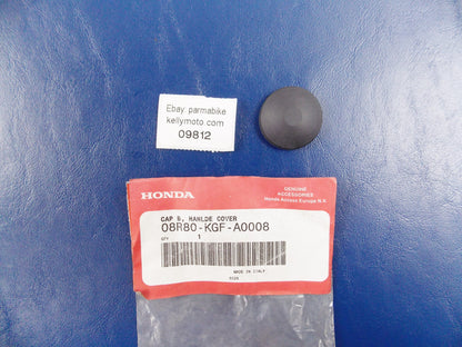 NOS OEM 2000-2005 HONDA NES125  HANDLE COVER CAP B  08R80-KGF-A0008 - MotoRaider