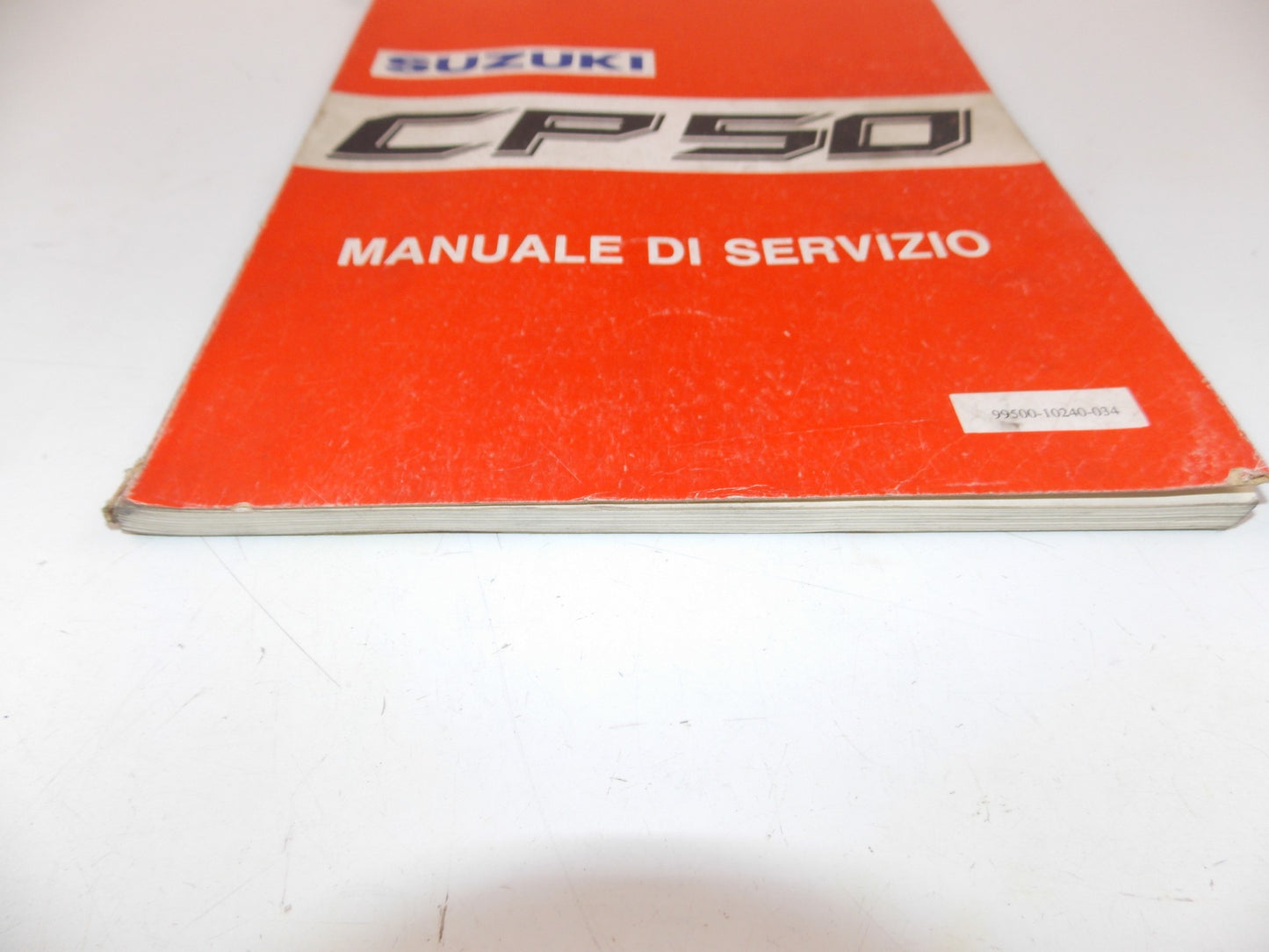 11/1990 SERVICE MANUAL CATALOG BOOK SUZUKI SCOOTER CP50 ITALIAN 99500-10240-034 - MotoRaider