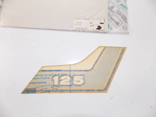 NOS OEM CAGIVA SXT 125 RIGHT SIDE PANEL STICKER "125" 800036602 - MotoRaider