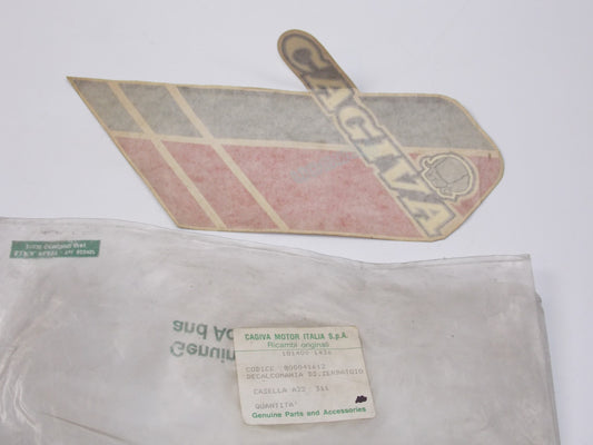 NOS OEM CAGIVA ALETTA ROSSA RH GAS TANK STICKER "CAGIVA" 800041612 - MotoRaider