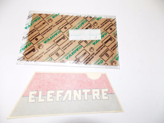 NOS OEM CAGIVA 87 ELEFANTRE 125 LH GAS TANK SHROUD STICKER "ELEFANTRE" 800052681 - MotoRaider